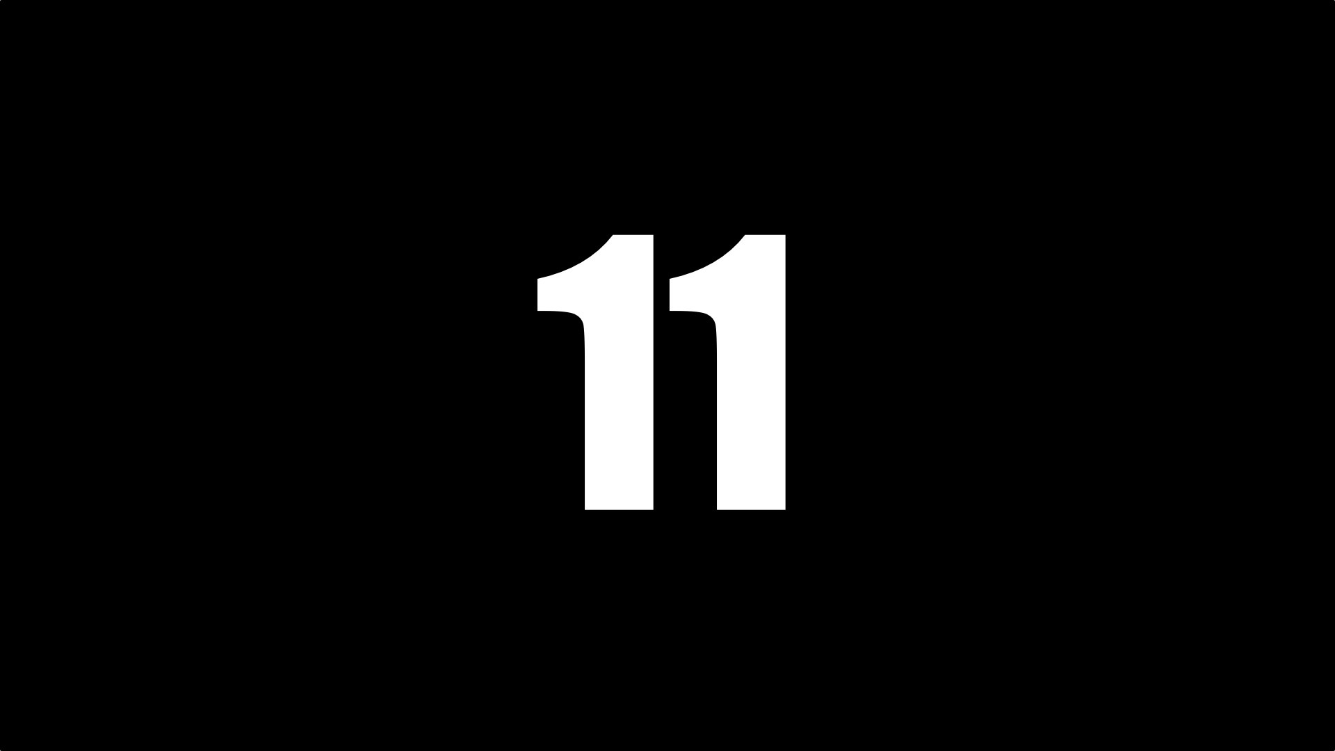 11. Цифра 11. Одиннадцать на черном фоне. Номер 11. Цифра 11 черная.