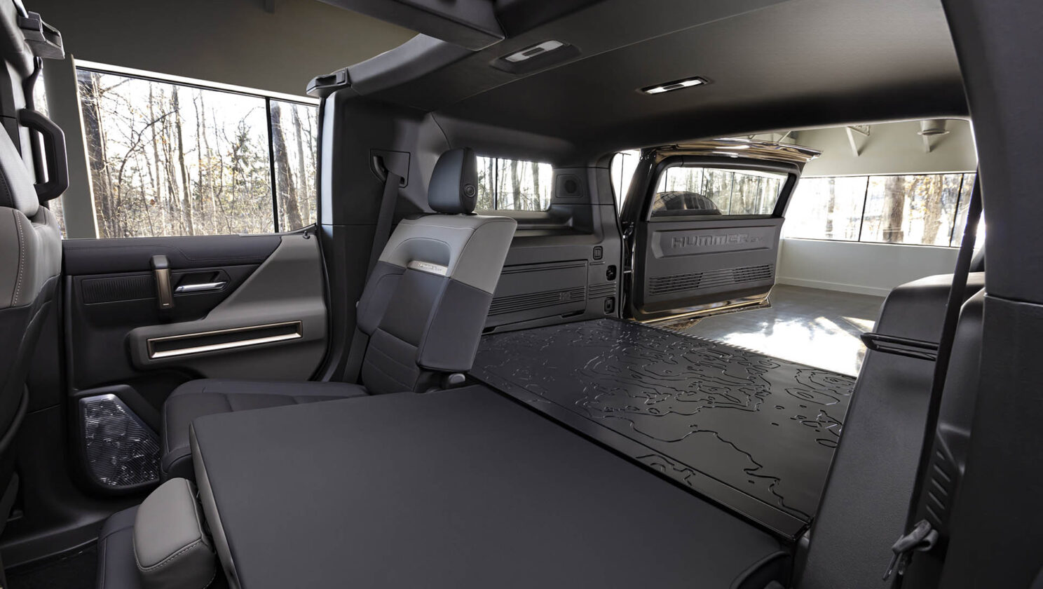 The GMC HUMMER EV SUV debuts in the low-contrast Lunar Shadow in